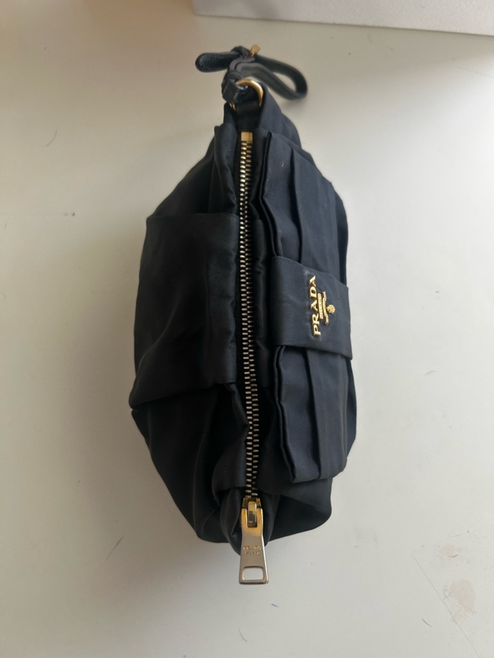 Prada Nylon Logo Ribbon Black Bow Wristlet with Gold Hardware
1N1422 - Picture 7 of 15